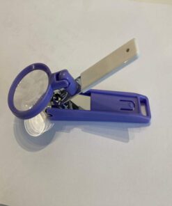 Magnetic magnifier with nail clippers