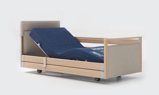 Upholstered profiling care bed with pressure care mattress