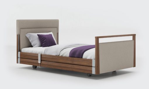 Upholstered profiling care bed with side rails inin Walnut
