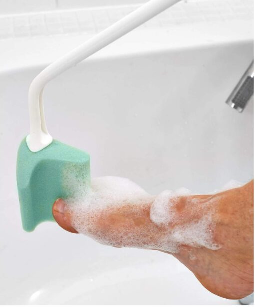 Washing toes with a comfort grip toe sponge