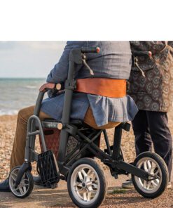 Man sitting on combi rollator wheelchair